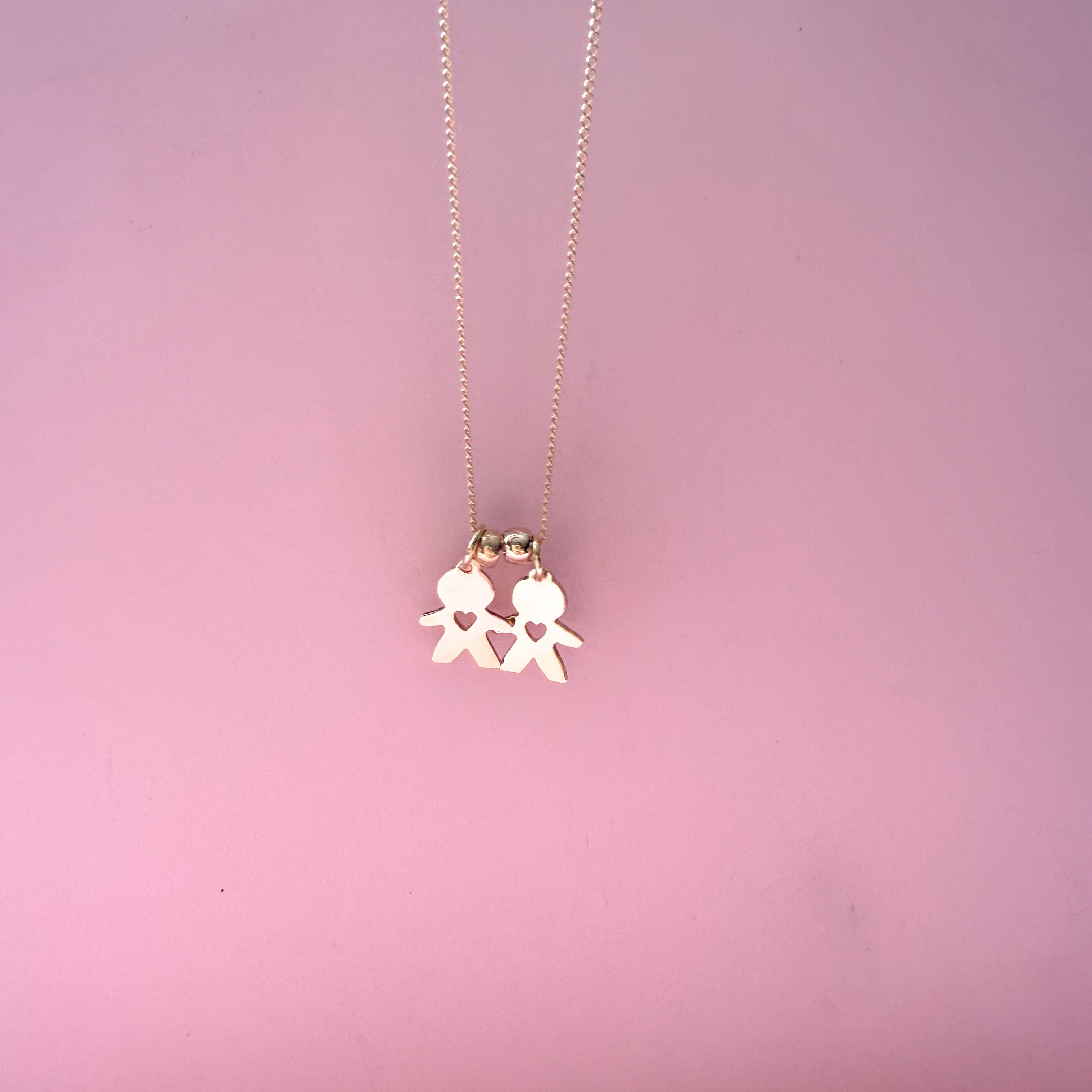 Collar con 2 dijes de Niños o Niñas con corazón calado
